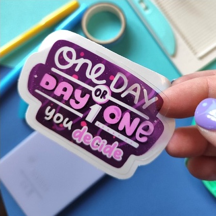 Novelty Die cut vinyl in white or clear sticker with cute quote ONe day or day one, you decide. Perfect for laptops, water bottle customisation and more.