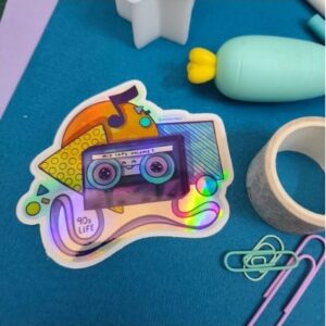 75x77mm Weatherproof die-cut nineties nostalgia sticker of casette mixed tapes before the invention of music streaming, perfect for laptop, waterbottle or other customisations, cute colours and perfect for that nineties kid